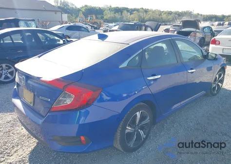 2016 Honda Civic Touring z USA, uszkodzony, nr VIN 19XFC1F97GE023385